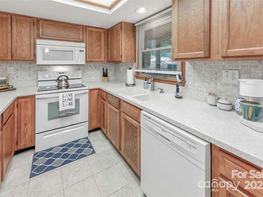 385 Whitney Boulevard, Lake Lure, NC 28746.  MLS# CAR4221622, YatesRealty ID 14799. 