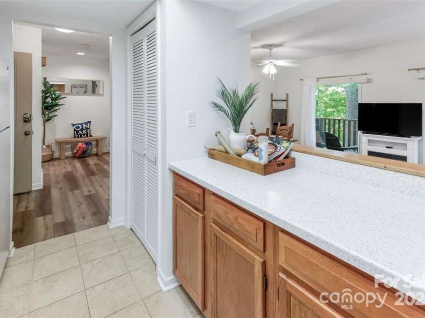 385 Whitney Boulevard, Lake Lure, NC 28746.  MLS# CAR4221622, YatesRealty ID 14799. 