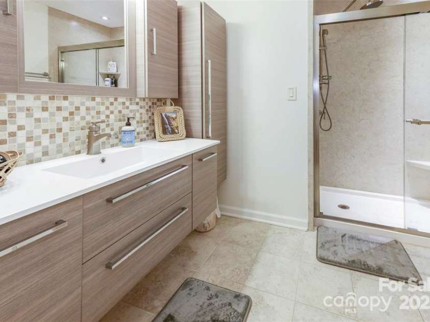 385 Whitney Boulevard, Lake Lure, NC 28746.  MLS# CAR4221622, YatesRealty ID 14799. 