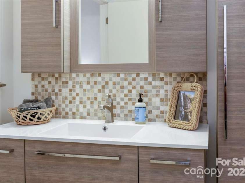 385 Whitney Boulevard, Lake Lure, NC 28746.  MLS# CAR4221622, YatesRealty ID 14799. 