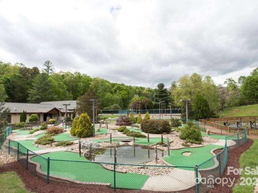 385 Whitney Boulevard, Lake Lure, NC 28746.  MLS# CAR4221622, YatesRealty ID 14799. 