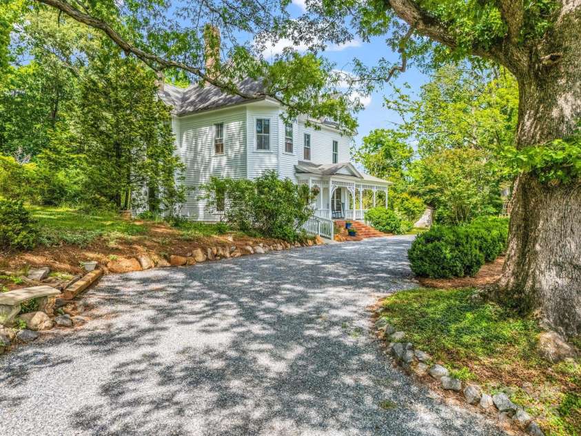 1111 Bills Creek Road, Lake Lure, NC 28746.  MLS# CAR4273811, YatesRealty ID 148. Ample parking to barns and home