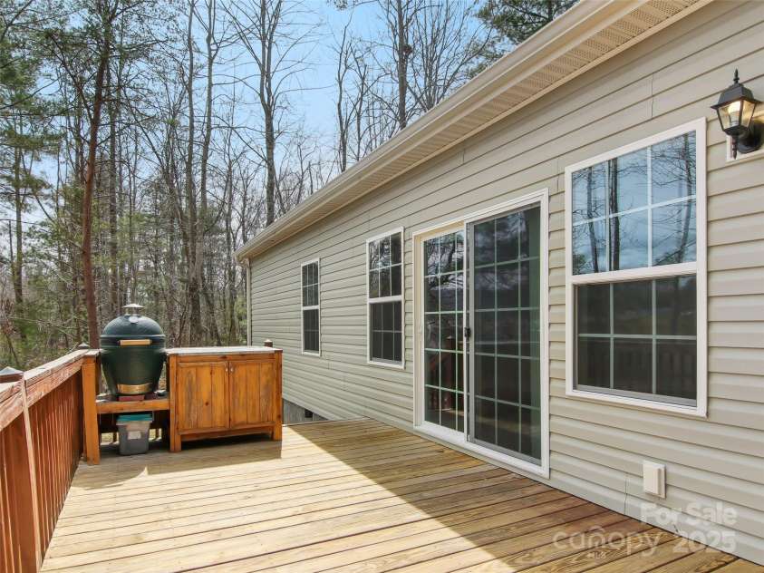14 Fox Run Drive, Fairview, NC 28730.  MLS# CAR4237323, YatesRealty ID 14804. Deck w/ Green Egg that conveys with the house