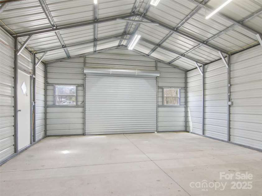 14 Fox Run Drive, Fairview, NC 28730.  MLS# CAR4237323, YatesRealty ID 14804. Metal garage/work space