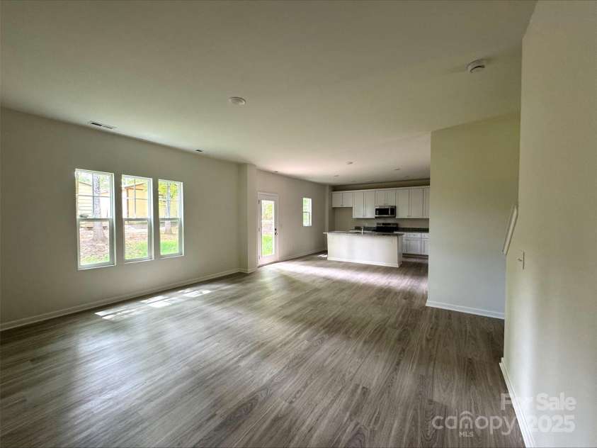 164 Wildwood Loop, Statesville, NC 28677.  MLS# CAR4203162, YatesRealty ID 14808. Living area to kitchen