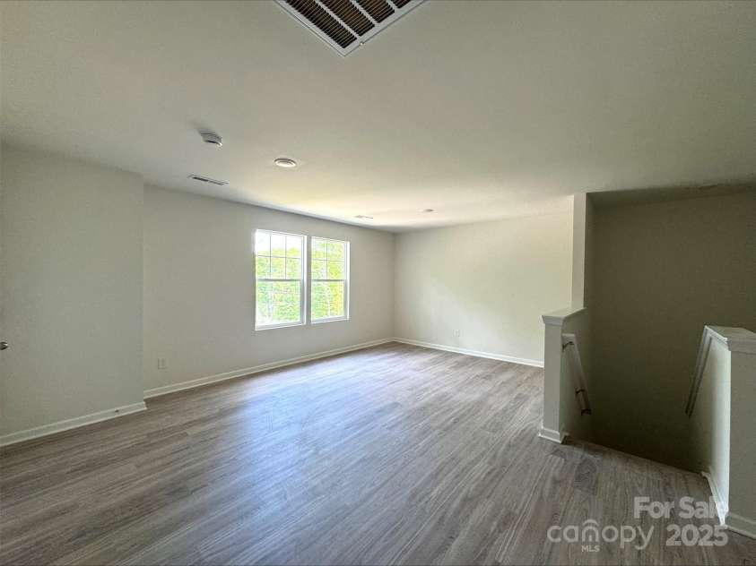 164 Wildwood Loop, Statesville, NC 28677.  MLS# CAR4203162, YatesRealty ID 14808. Second Floor Large Loft
