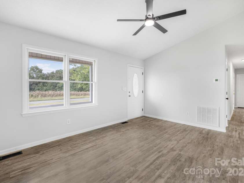 215 Bethesda Road, Statesville, NC 28677.  MLS# CAR4124673, YatesRealty ID 14810. Living Room