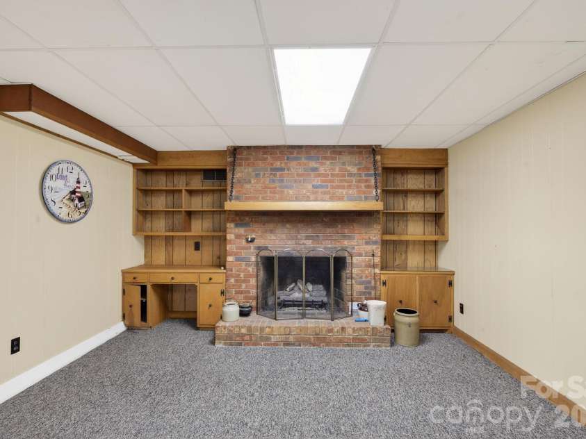 708 Wilmore Street, Lenoir, NC 28645.  MLS# CAR4360264, YatesRealty ID 14812. Fireplace in basement