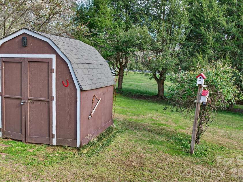 708 Wilmore Street, Lenoir, NC 28645.  MLS# CAR4360264, YatesRealty ID 14812. Storage shed