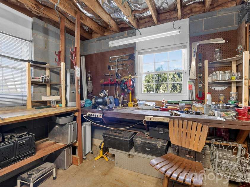 708 Wilmore Street, Lenoir, NC 28645.  MLS# CAR4360264, YatesRealty ID 14812. Workshop in basement