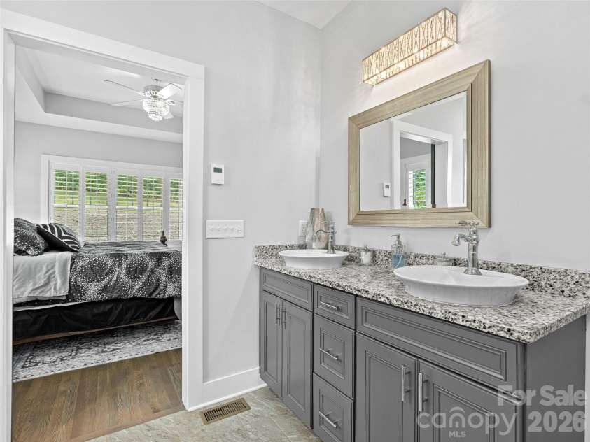 139 Clay Street, Fairview, NC 28730.  MLS# CAR4308296, YatesRealty ID 14813. Double sinks, and granite countertops.