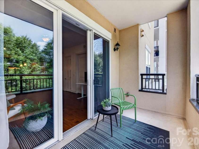 4625 Piedmont Row Drive, Charlotte, NC 28210.  MLS# CAR4400741, YatesRealty ID 14816. Peaceful covered balcony