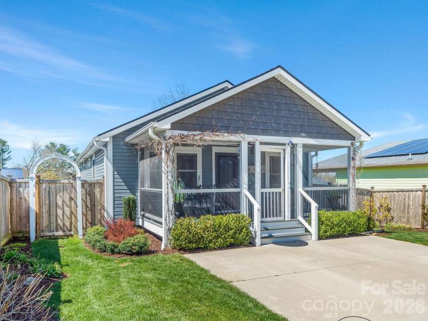 482 Booker Street, Asheville, NC 28803.  MLS# CAR4362039, YatesRealty ID 14819. Beautiful wisteria plant will be blooming soon. 
