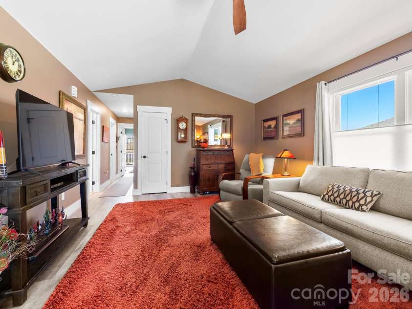 482 Booker Street, Asheville, NC 28803.  MLS# CAR4362039, YatesRealty ID 14819. Living room with vaulted ceiling