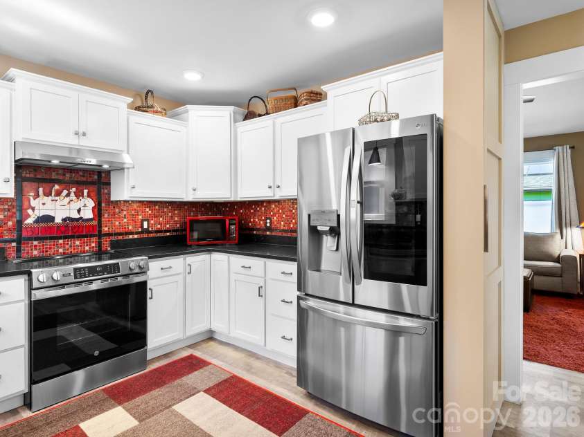 482 Booker Street, Asheville, NC 28803.  MLS# CAR4362039, YatesRealty ID 14819. Refrigerator conveys 