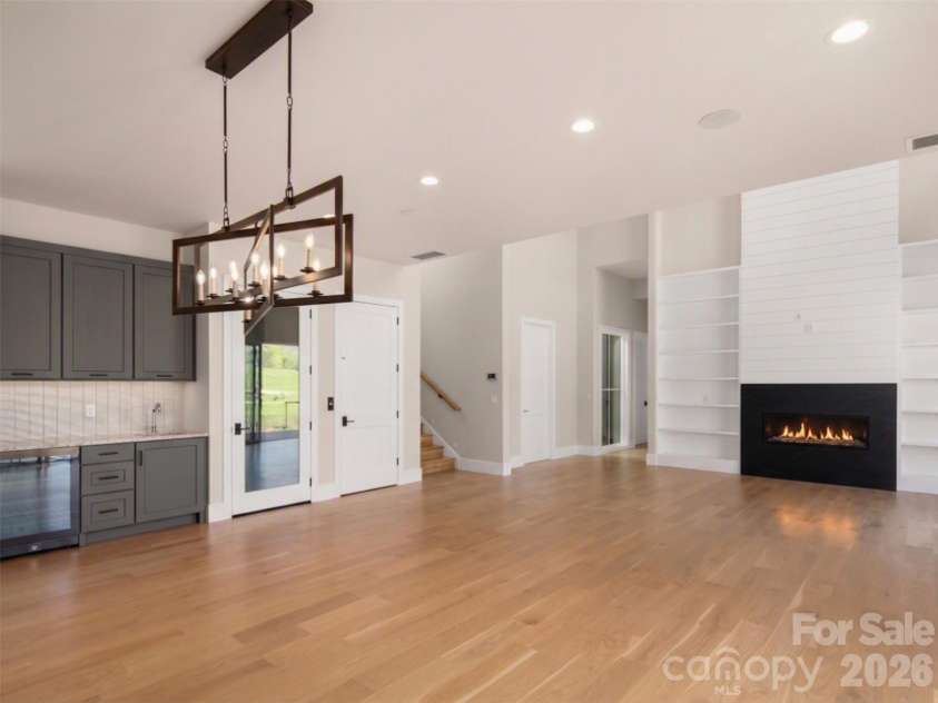 6 Walnut Valley Parkway, Arden, NC 28704.  MLS# CAR4368458, YatesRealty ID 14824. Virtually edited to include completed fireplace.