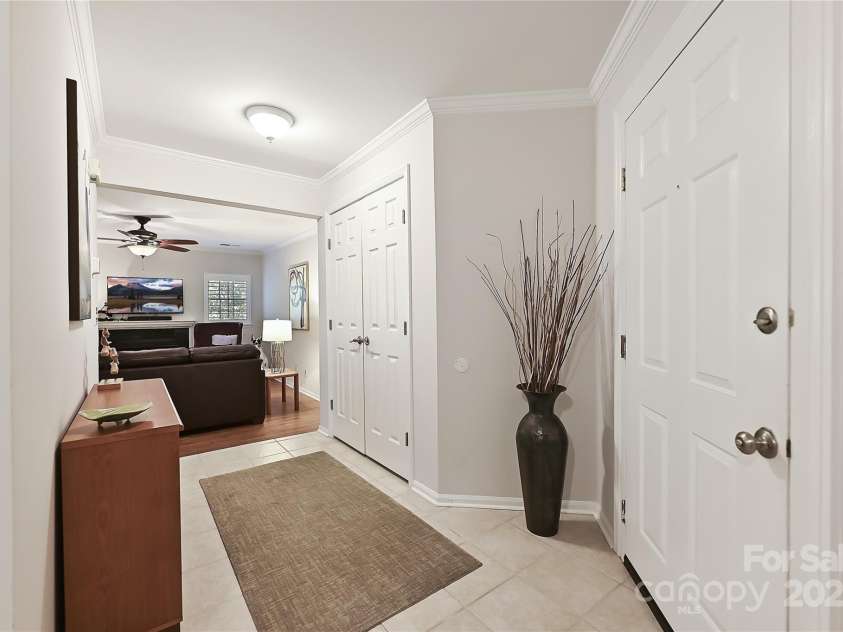 19901 Henderson Road, Cornelius, NC 28031.  MLS# CAR4306229, YatesRealty ID 14825. Ceramic Foyer opens to the Great Room