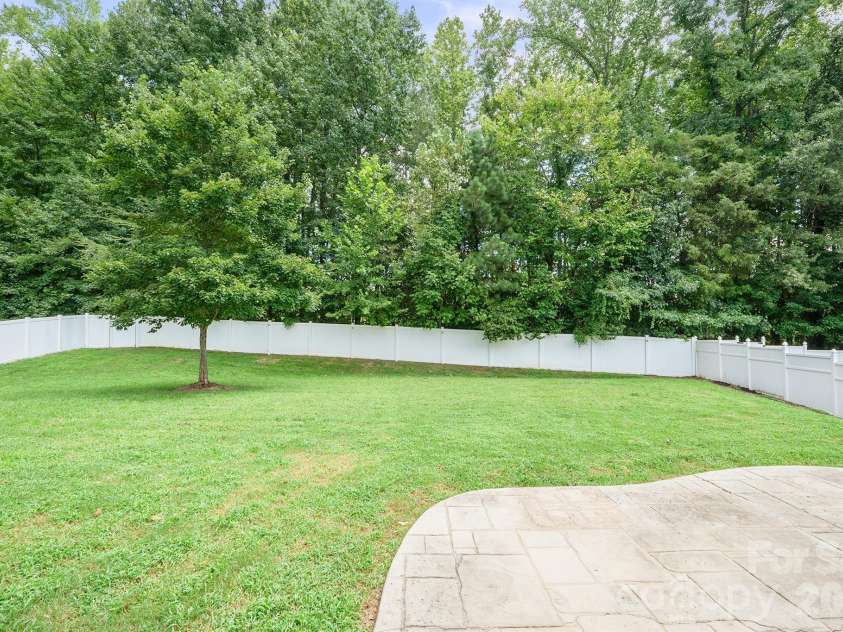 8920 Lake Pines Drive, Cornelius, NC 28031.  MLS# CAR4369266, YatesRealty ID 14825. Huge, flat, fenced rear yard.