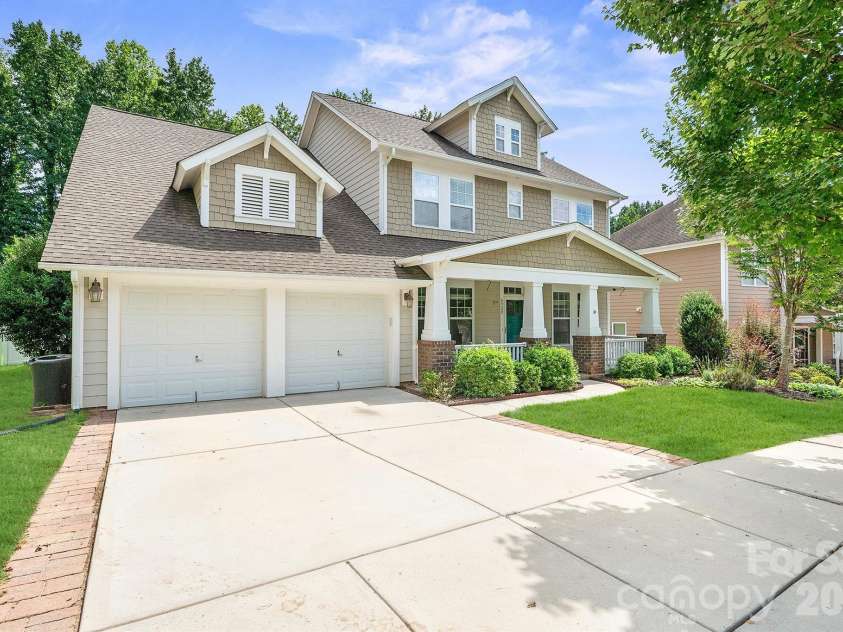 8920 Lake Pines Drive, Cornelius, NC 28031.  MLS# CAR4369266, YatesRealty ID 14825. Immaculate Craftsman with Primary Suite on Main! 