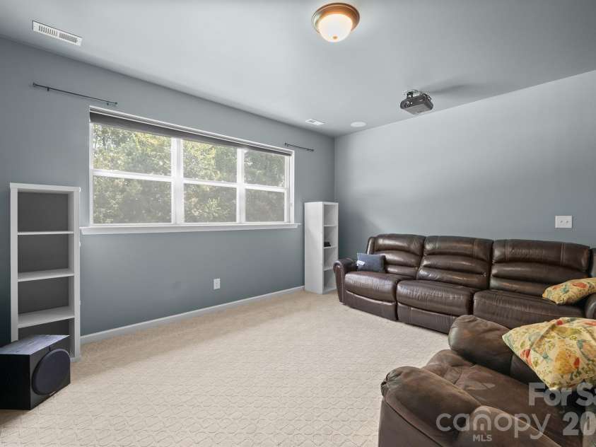8920 Lake Pines Drive, Cornelius, NC 28031.  MLS# CAR4369266, YatesRealty ID 14825. Media Room