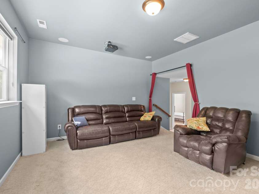 8920 Lake Pines Drive, Cornelius, NC 28031.  MLS# CAR4369266, YatesRealty ID 14825. Media Room
