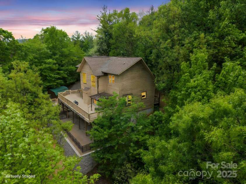132 Vacation Way, Millers Creek, NC 28651.  MLS# CAR4254466, YatesRealty ID 14827. Extremely private with 4+ acres and one of less than 5 homes  on the mountain