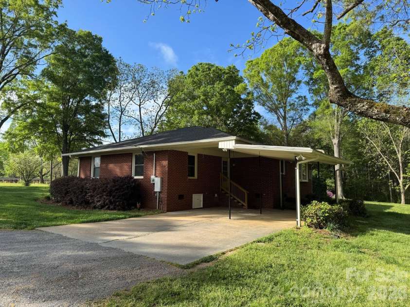 3160 Long Meadow Road, Rock Hill, SC 29730.  MLS# CAR4363826, YatesRealty ID 14832.  Carport side 