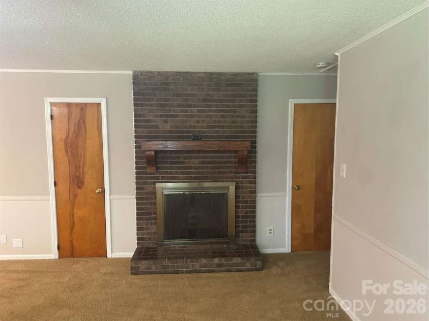 3160 Long Meadow Road, Rock Hill, SC 29730.  MLS# CAR4363826, YatesRealty ID 14832. Fireplace in den