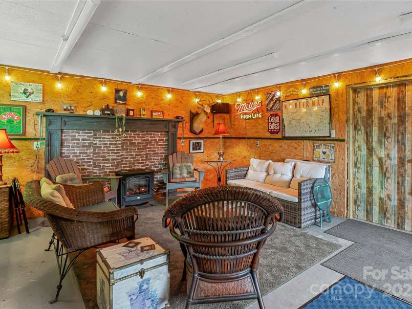 283 Grapevine Cove, Waynesville, NC 28785.  MLS# CAR4260835, YatesRealty ID 14836. A special bonus space currently used as the 