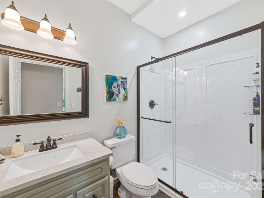 283 Grapevine Cove, Waynesville, NC 28785.  MLS# CAR4260835, YatesRealty ID 14836. Downstairs guest bath