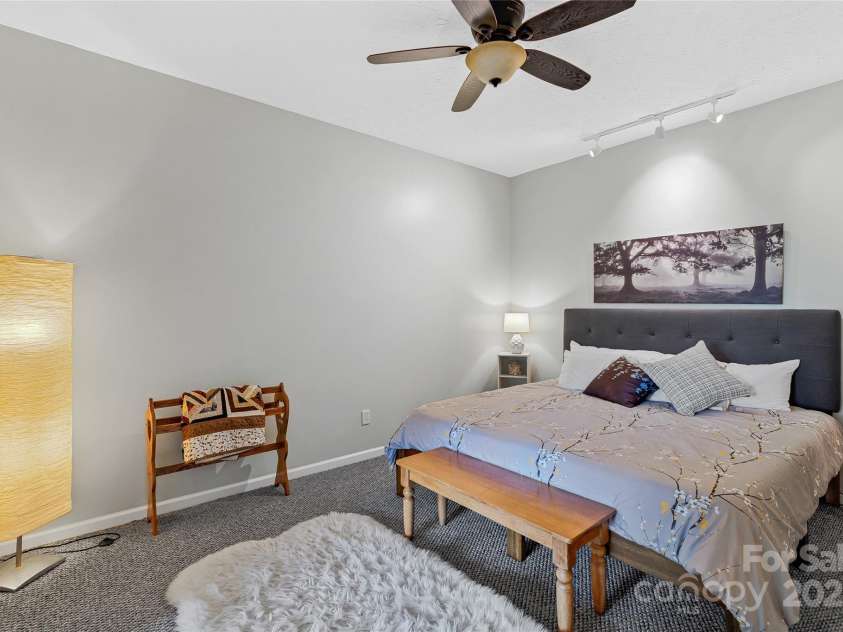 283 Grapevine Cove, Waynesville, NC 28785.  MLS# CAR4260835, YatesRealty ID 14836. Downstairs guest bedroom