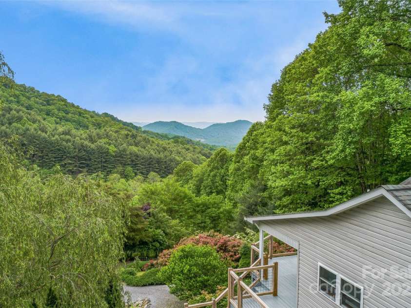 283 Grapevine Cove, Waynesville, NC 28785.  MLS# CAR4260835, YatesRealty ID 14836. Greeted by the Great Smokies every morning.