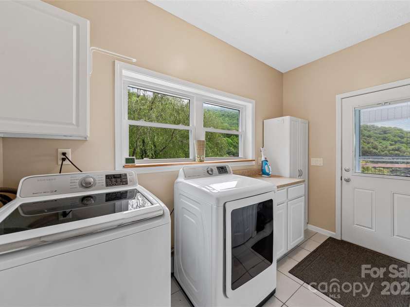 283 Grapevine Cove, Waynesville, NC 28785.  MLS# CAR4260835, YatesRealty ID 14836. Laundry room on main