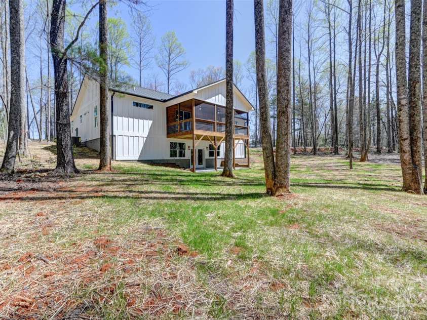 1356 Brightwater Drive, Hendersonville, NC 28739.  MLS# CAR4242323, YatesRealty ID 14842. Large back yard