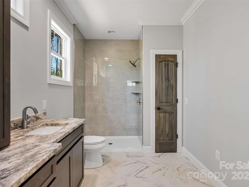 1356 Brightwater Drive, Hendersonville, NC 28739.  MLS# CAR4242323, YatesRealty ID 14842. Primary Bath