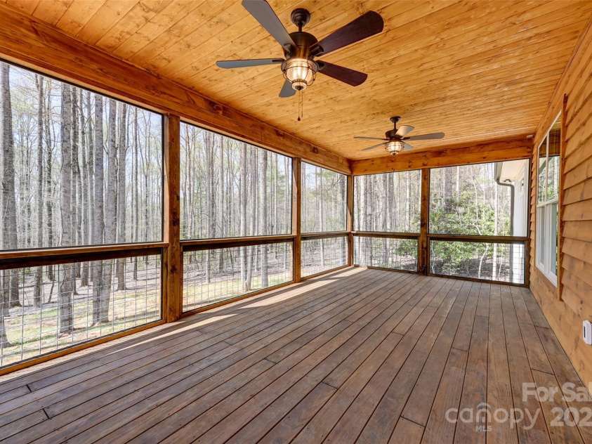 1356 Brightwater Drive, Hendersonville, NC 28739.  MLS# CAR4242323, YatesRealty ID 14842. Screened porch off living area