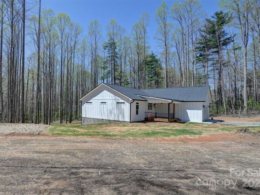 1356 Brightwater Drive, Hendersonville, NC 28739.  MLS# CAR4242323, YatesRealty ID 14842. Side yard view
