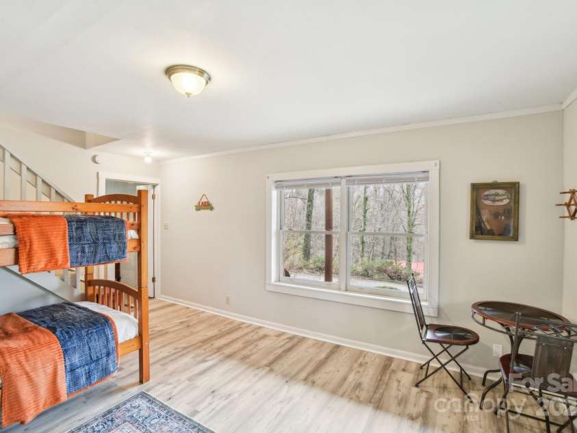 217 Chalet Road, Lake Lure, NC 28746.  MLS# CAR4232804, YatesRealty ID 14846. Downstairs/Basement Bunkroom