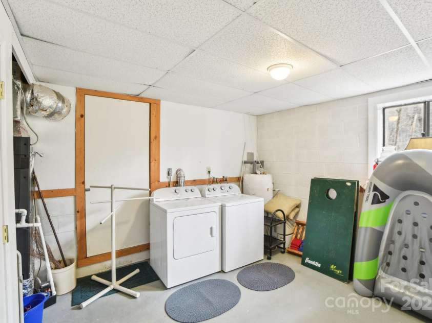 217 Chalet Road, Lake Lure, NC 28746.  MLS# CAR4232804, YatesRealty ID 14846. Laundry