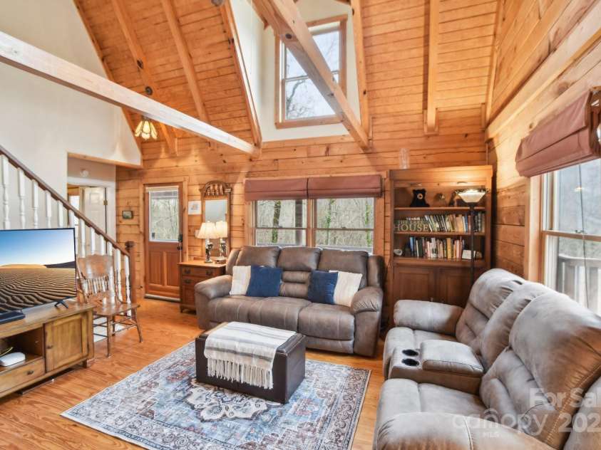 217 Chalet Road, Lake Lure, NC 28746.  MLS# CAR4232804, YatesRealty ID 14846. Living Room