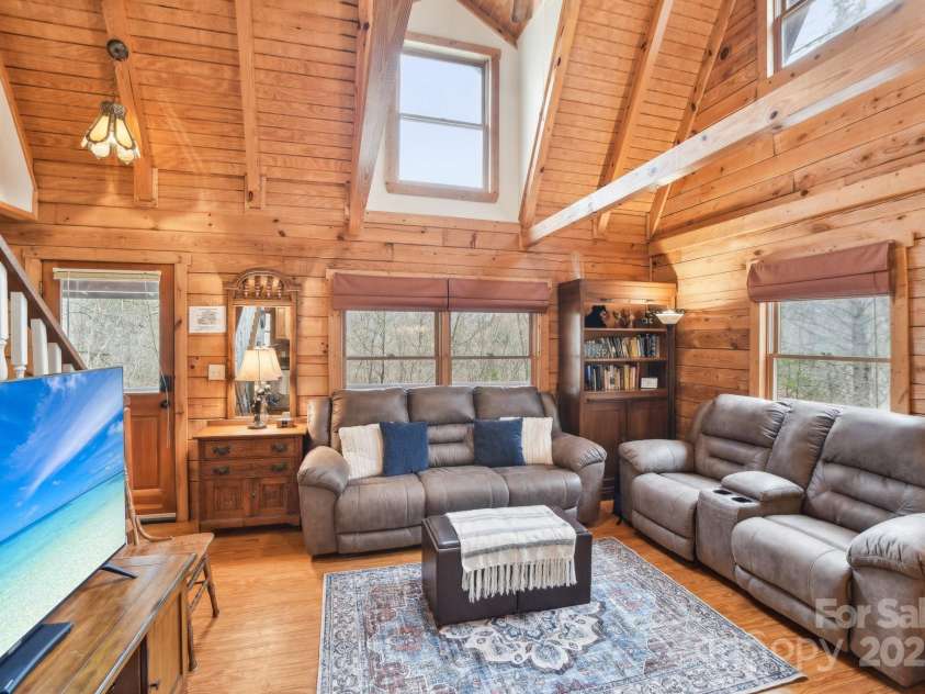 217 Chalet Road, Lake Lure, NC 28746.  MLS# CAR4232804, YatesRealty ID 14846. Living Room