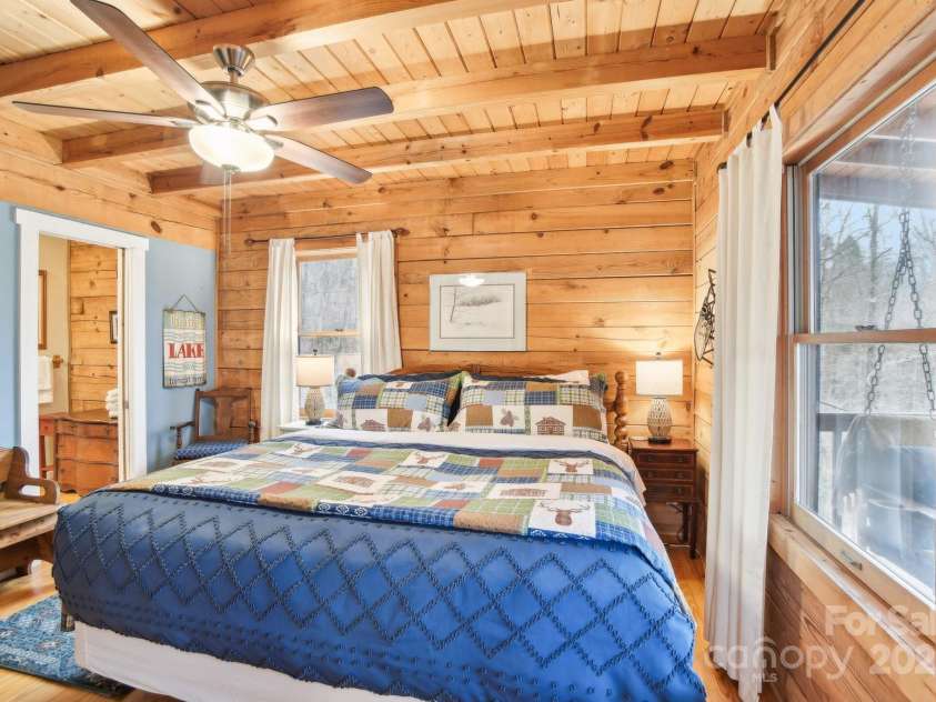 217 Chalet Road, Lake Lure, NC 28746.  MLS# CAR4232804, YatesRealty ID 14846. Main Primary Level Bedroom