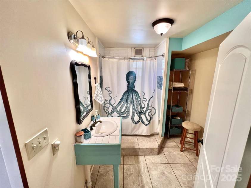954 Mount Hebron Road, Old Fort, NC 28762.  MLS# CAR4249609, YatesRealty ID 14848. Main Bathroom