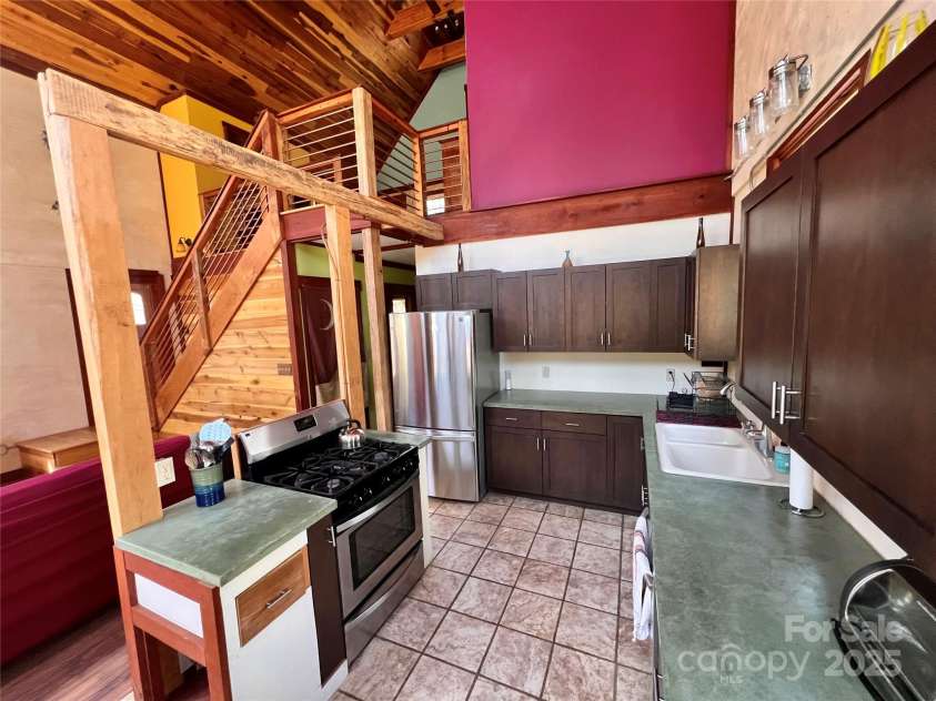 954 Mount Hebron Road, Old Fort, NC 28762.  MLS# CAR4249609, YatesRealty ID 14848. Stained concrete countertops