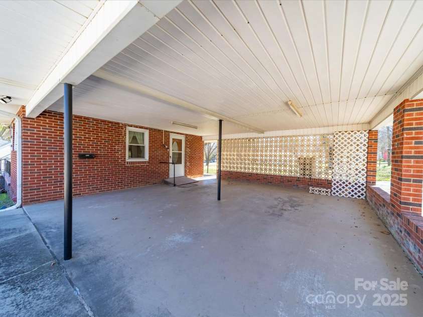 2310 Clay Street, Kannapolis, NC 28083.  MLS# CAR4231335, YatesRealty ID 14850. Carport