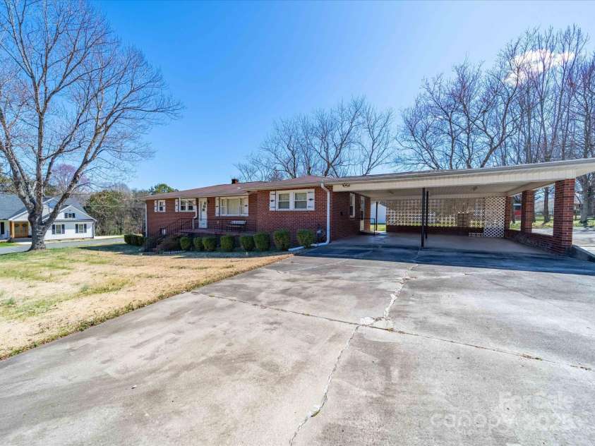 2310 Clay Street, Kannapolis, NC 28083.  MLS# CAR4231335, YatesRealty ID 14850. Front of house from driveway