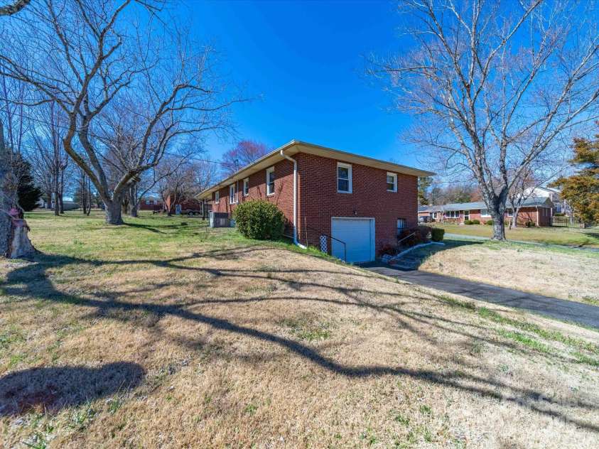 2310 Clay Street, Kannapolis, NC 28083.  MLS# CAR4231335, YatesRealty ID 14850. Left side of house