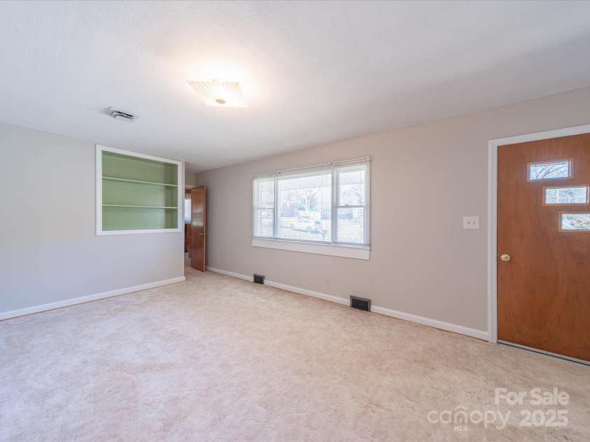 2310 Clay Street, Kannapolis, NC 28083.  MLS# CAR4231335, YatesRealty ID 14850. Living room