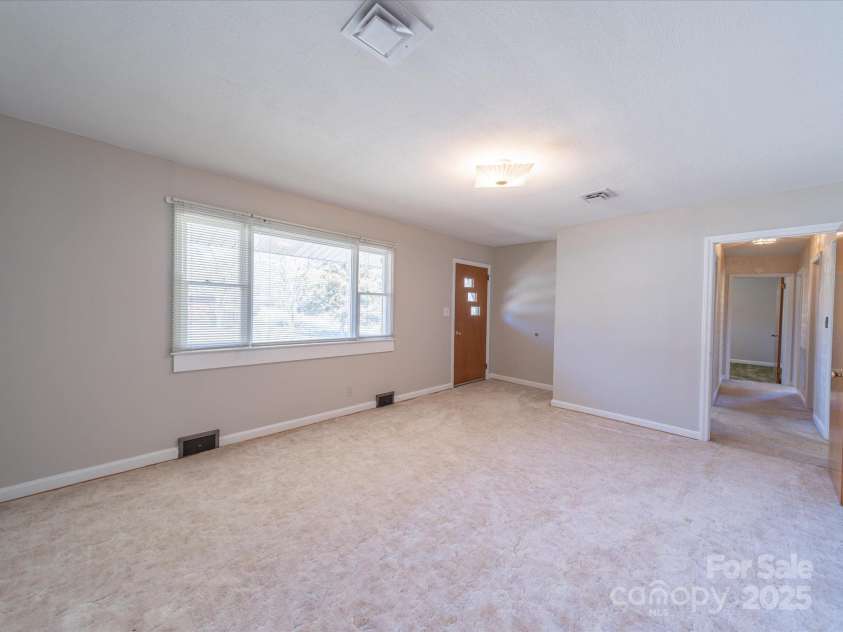 2310 Clay Street, Kannapolis, NC 28083.  MLS# CAR4231335, YatesRealty ID 14850. Living room