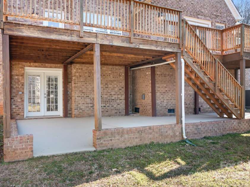 126 Emerald Drive, Mooresville, NC 28117.  MLS# CAR4224232, YatesRealty ID 14855. Covered Back Patio perfect for relaxing